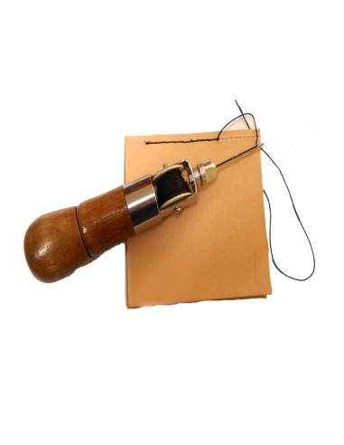 Awl with thread for sewing leather. Tool for sewing leather