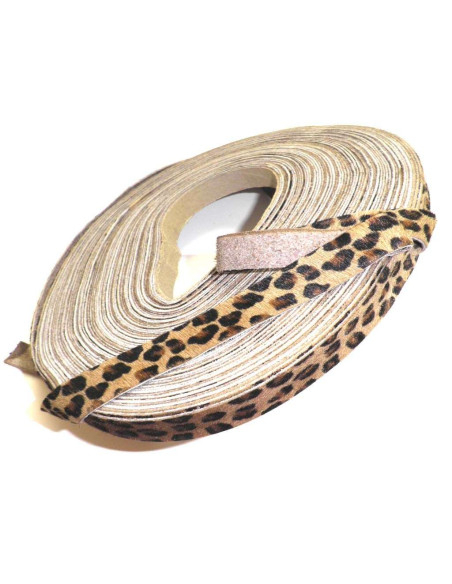 TIRAS DE PELE E CABELO. MOTIVO LEOPARDO